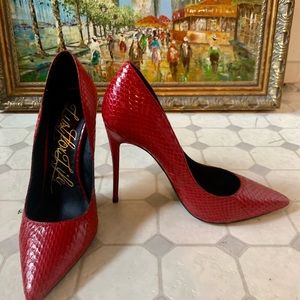 Red snakeskin Lust For Life pump with 5” stiletto heel.